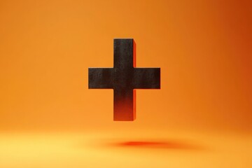 Obraz premium Black cross on orange background