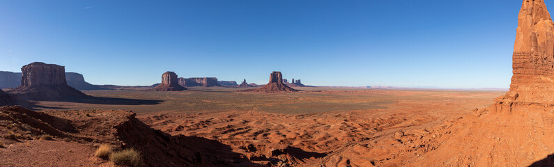 Fototapeta premium Monument Valley Rock Formations, Arizona-Utah Border, USA – Iconic Desert Landscapes with Majestic Buttes and Mesas, Captured in Stunning Light and Natural Splendor