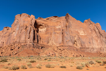 Fototapeta premium Monument Valley Rock Formations, Arizona-Utah Border, USA – Iconic Desert Landscapes with Majestic Buttes and Mesas, Captured in Stunning Light and Natural Splendor