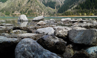 stones near a mountain lake