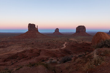 Monument Valley Rock Formations, Arizona-Utah Border, USA – Iconic Desert Landscapes with Majestic Buttes and Mesas,  Captured in Breathtaking Sunset Light