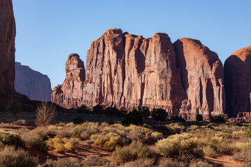 Fototapeta premium Monument Valley Rock Formations, Arizona-Utah Border, USA – Iconic Desert Landscapes with Majestic Buttes and Mesas, Captured in Stunning Light and Natural Splendor