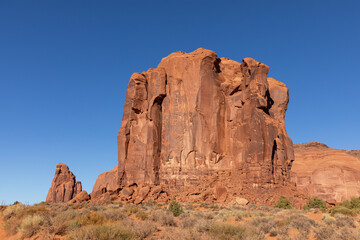 Fototapeta premium Monument Valley Rock Formations, Arizona-Utah Border, USA – Iconic Desert Landscapes with Majestic Buttes and Mesas, Captured in Stunning Light and Natural Splendor