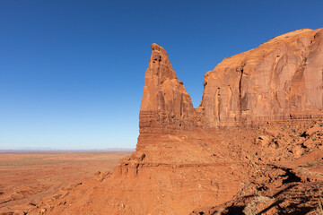 Fototapeta premium Monument Valley Rock Formations, Arizona-Utah Border, USA – Iconic Desert Landscapes with Majestic Buttes and Mesas, Captured in Stunning Light and Natural Splendor
