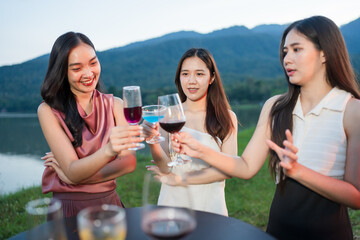 Asian women celebrate, meet and talk in bars. Tourist attractions, beautiful lights