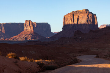 Monument Valley Rock Formations, Arizona-Utah Border, USA – Iconic Desert Landscapes with Majestic Buttes and Mesas,  Captured in Breathtaking Sunset Light