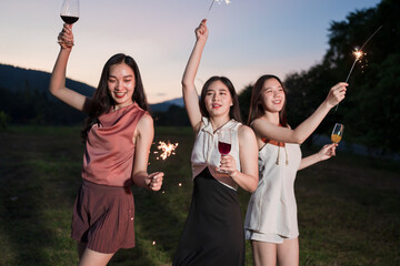 Asian women celebrate, meet and talk in bars. Tourist attractions, beautiful lights