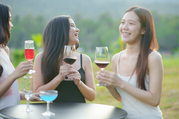 Asian women celebrate, meet and talk in bars. Tourist attractions, beautiful lights