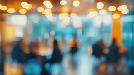 Fototapeta premium Contemporary glass-walled conference room with blurred silhouettes of attendees engaged in a meeting under warm, ambient lighting.