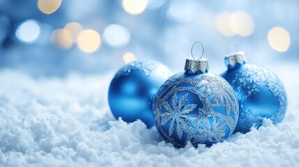 Festive light blue background adorned with sparkling Christmas ornaments and a snowy texture, providing ample space for text or additional images.