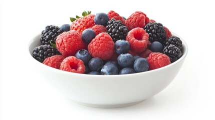 A bowl of vibrant mixed berries including strawberries, blueberries, raspberries