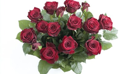 Fototapeta premium Elegant overhead view of a lush red rose bouquet surrounded by vibrant green leaves against a clean white background.