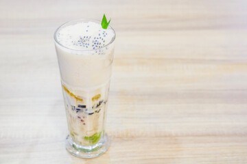 Ice or Es Teler on the table with copy space