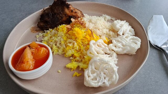 Basmati rice with grilled chicken, crackers, and fermented pinneaple 