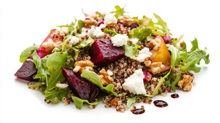 A colorful quinoa salad with mixed greens, roasted beets, goat cheese crumbles