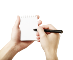 Hands holding a small spiral notebook with a pen, ready to write on a white background. Concept of note-taking, creativity, brainstorming, or ideas