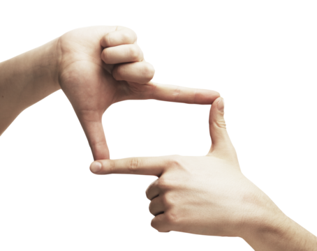 Closeup of two human hands forming a rectangle shape with fingers on a white background. Concept of framing, focus, or perspective