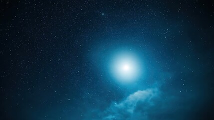 Fototapeta premium Starry Night Sky with Bright Moonlight Illuminating Clouds and Creating a Serene Atmosphere in a Peaceful Natural Setting Under a Beautiful Universe