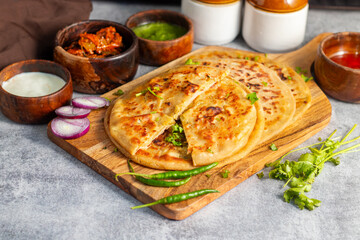 Aloo paratha, a popular North Indian dish from Punjab, Uttar Pradesh, and Bihar, is a stuffed...
