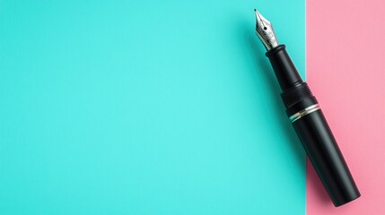 Fototapeta premium A fountain pen resting on a two-toned background.