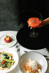 Authentic Dining Moments: Culinary Delights, Drinks, and Atmosphere in a Vibrant Restaurant Setting