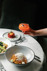 Authentic Dining Moments: Culinary Delights, Drinks, and Atmosphere in a Vibrant Restaurant Setting