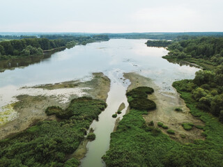 River winding through cracked, dry earth