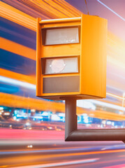 Traffic camera with yellow flash enforces speed limit
