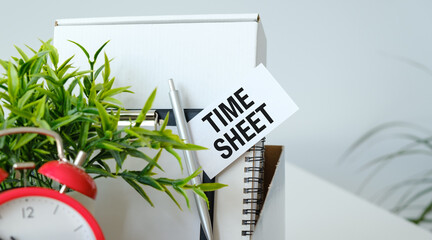 Time Sheet inscription on card message insticky note. Office background