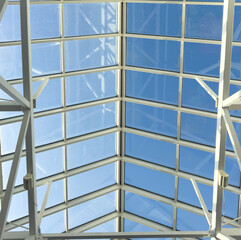 A clear blue sky with a white roof