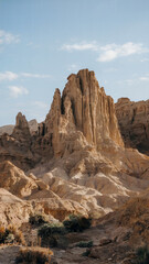 Fototapeta premium Mountain range with a large rock in the middle