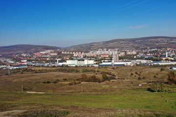 Obraz premium Aerial view of suburban city industrial area buildings