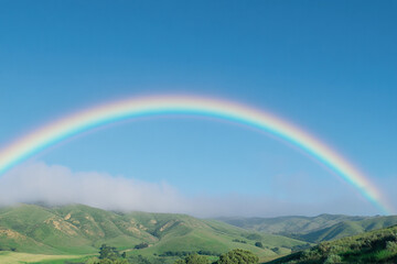 Fototapeta premium rainbow over the mountains