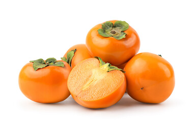 Persimmon fruit with cut in half isolated on white background. Clipping path.