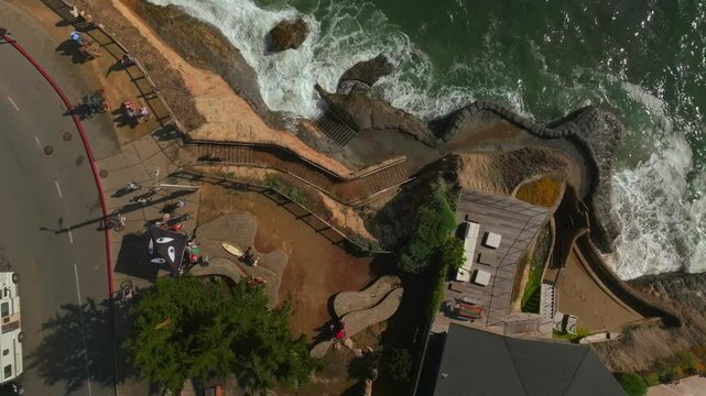 Santa Cruz Pleasure Point Park stairs Opal Cliffs California aerial drone surfer surfing surf waves Steamers Lane Cliff Drive walk Capitola neighborhood Monterey Bay morning mist birdseye upwards