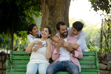 Happy Indian Family interacting with each other in Candid moment