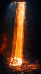 A stunning waterfall illuminated by warm light, creating a dramatic contrast against the dark surroundings, showcasing nature's beauty.