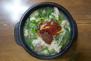 Blood Sausage and Rice Soup in earthen pot