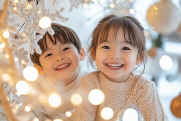 クリスマスイルミネーションを楽しむ日本人の子供たち