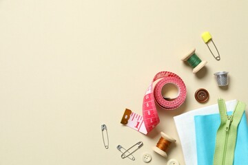 Flat lay composition with different sewing supplies on color background