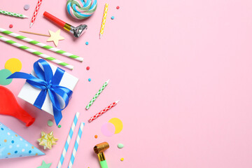 Frame of different party items and decorations with space for text on color background, flat lay