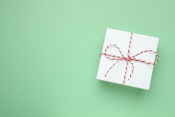 Beautiful gift boxes tied with bows on white background 