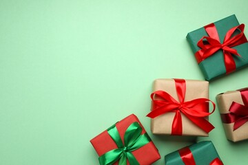 Beautiful gift boxes tied with bows on white background 