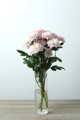 Beautiful pink flowers in a vase on the table