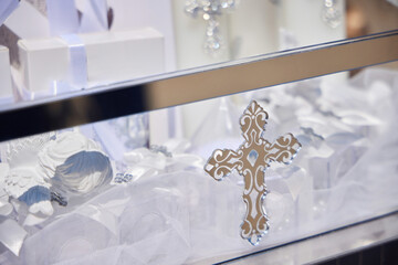 A gift set for the christening of a child. Candles, clothes and offerings. Caucasian traditions