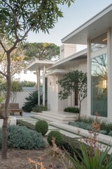 Fototapeta premium Modern Contemporary Home with Floor-to-Ceiling Windows and Beautiful Landscaping