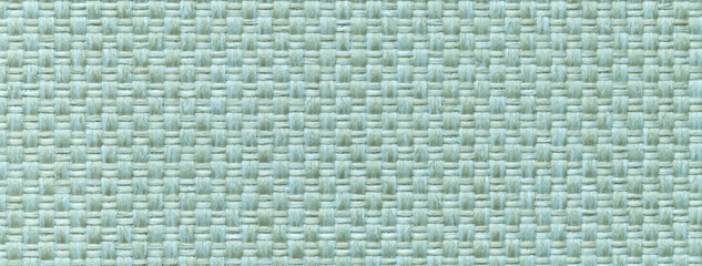 Fototapeta premium Texture light cyan background from woven textile with wicker pattern, macro. Structure vintage mint fabric