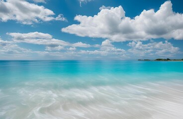Fototapeta premium tranquil beach scene with crystal-clear turquoise waters, gentle waves lapping the shore, and a brilliant blue sky