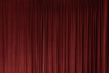 Red curtain in theatre background