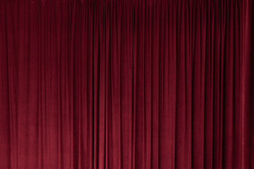 Red curtain in theatre background